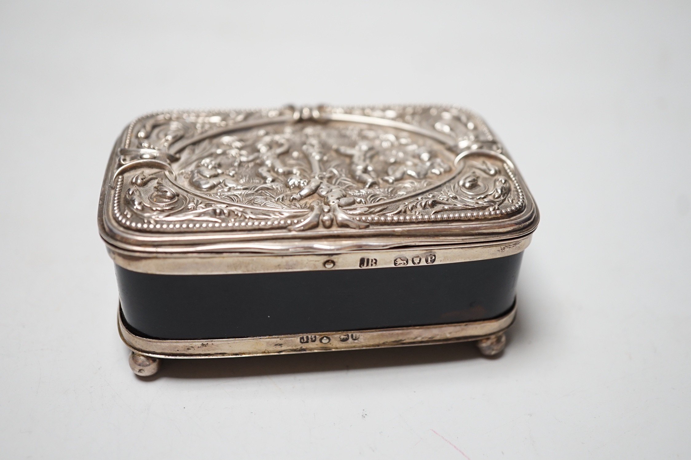 A late Victorian silver mounted tortoiseshell rectangular box and cover, on ball feet, Joseph Braham, London, 1890, 85mm.